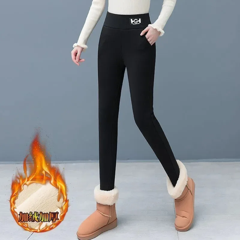 Leggings gruesos de felpa con bolsillos para mujer, pantalones ajustados térmicos elásticos de cintura alta, moda de otoño e invierno, 2023