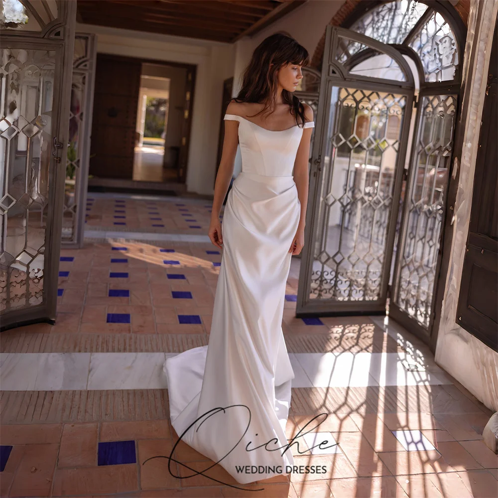 

Современное атласное свадебное платье QICHE в стиле русалка для женщин, с открытыми плечами, плиссированное, с вырезом-лодочкой, для свадебной вечеринки, Vestido De Noiva, на заказ