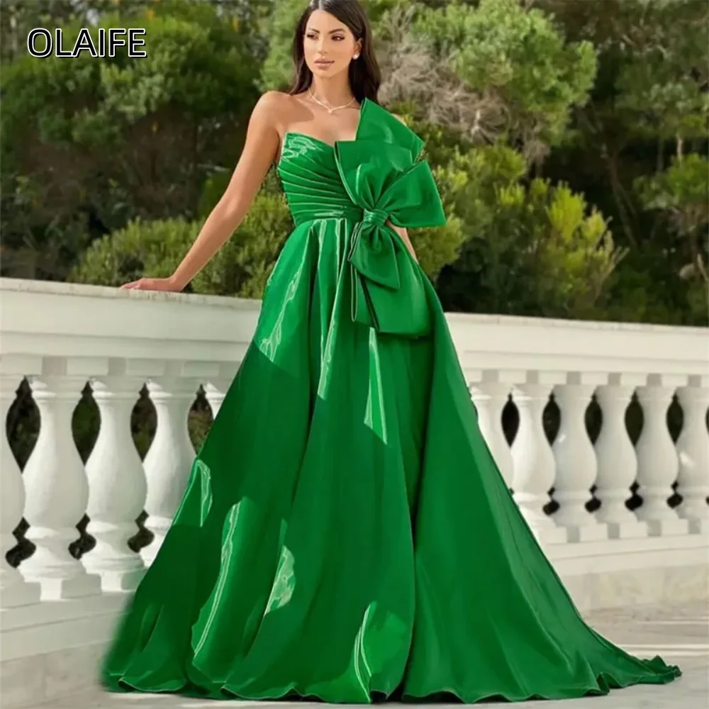 

Элегантные атласные вечерние платья без бретелек с бантом и рюшами А-силуэта Вечерние платья по индивидуальному заказу без рукавов с карманом и скользящим шлейфом فساتين س