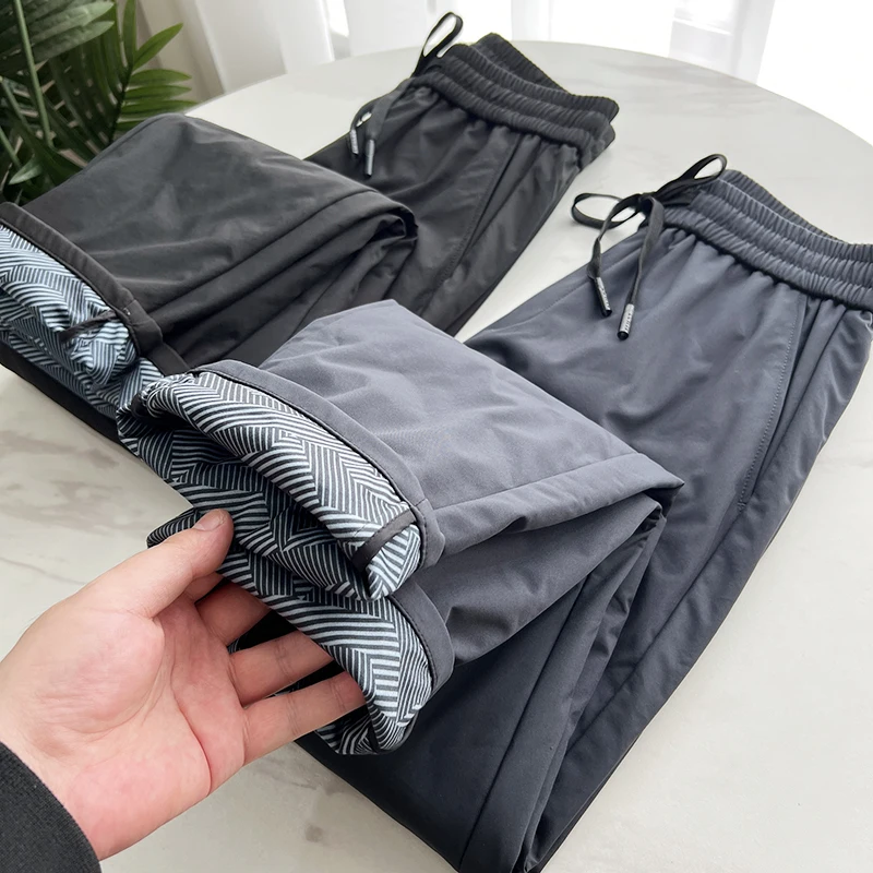 

Мужские пуховые брюки с высоким содержанием утиного пуха (90%), водонепроницаемые, с термоизоляцией, осенне-зимние, прямого кроя, длинные, модные, городские.