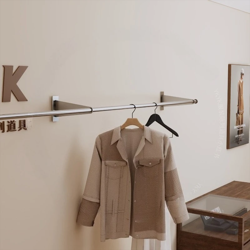 

Wall Stainless Steel Garment Rack Brushed Clothing Rail Minimalist Boutique Display System High-End Ladies Fashion Display Shelf