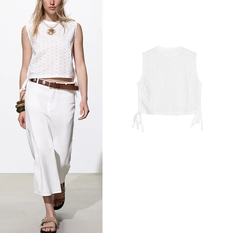 بلوزة نسائية صيفية وربيعية من القطن مطرزة ومفرغة بتصميم فراشة وعقدة عند الحافة، برقبة مستديرة وبدون أكمام، مريحة وفضفاضة