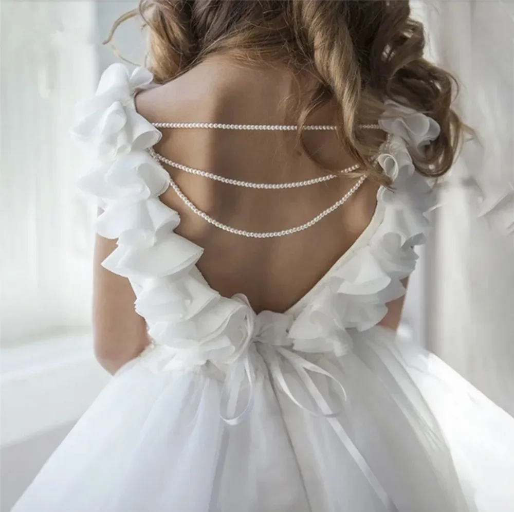 فستان المناولة الأولى مزين باللؤلؤ المطرز بدون أكمام بدون أكمام فستان فتاة الزهور لحفلات الزفاف للأطفال الصغار فستان التواصل المقدس