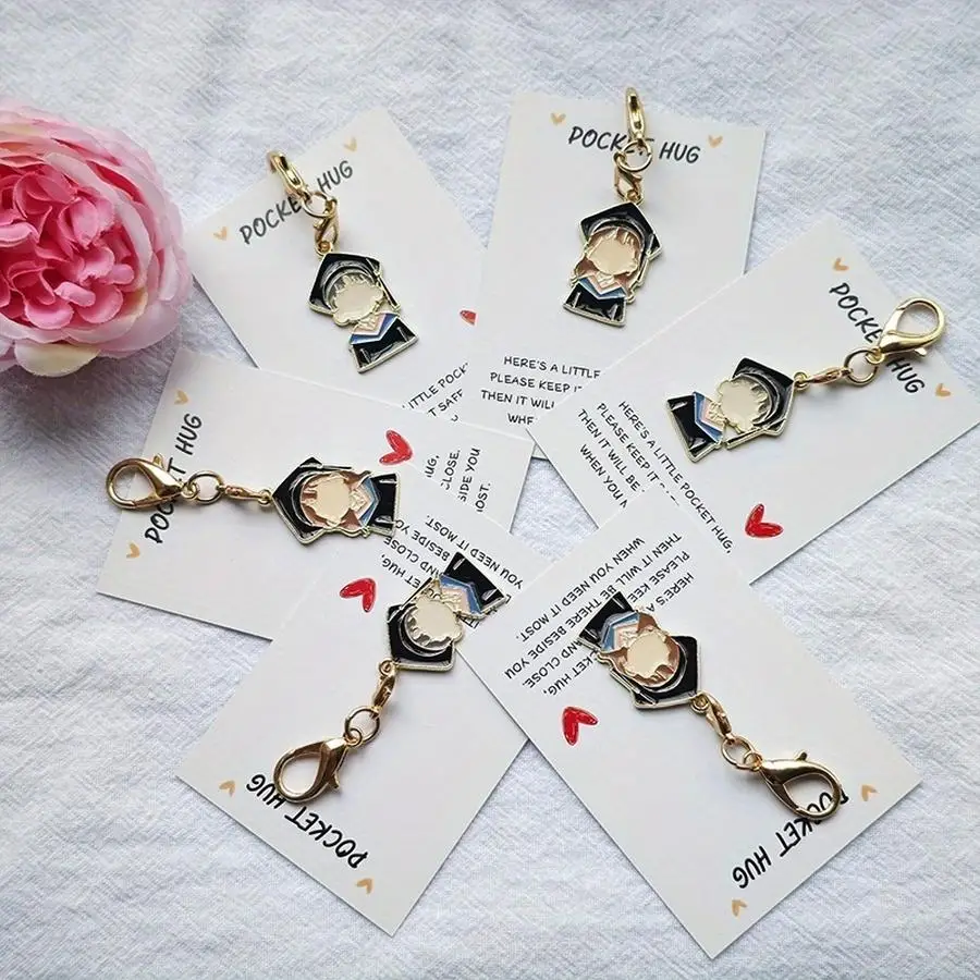 1/5/10/20/50/100pcs Adorable graduation-themed keychain featuring a graduation gown and cap, along with a pocket-sized hug. This