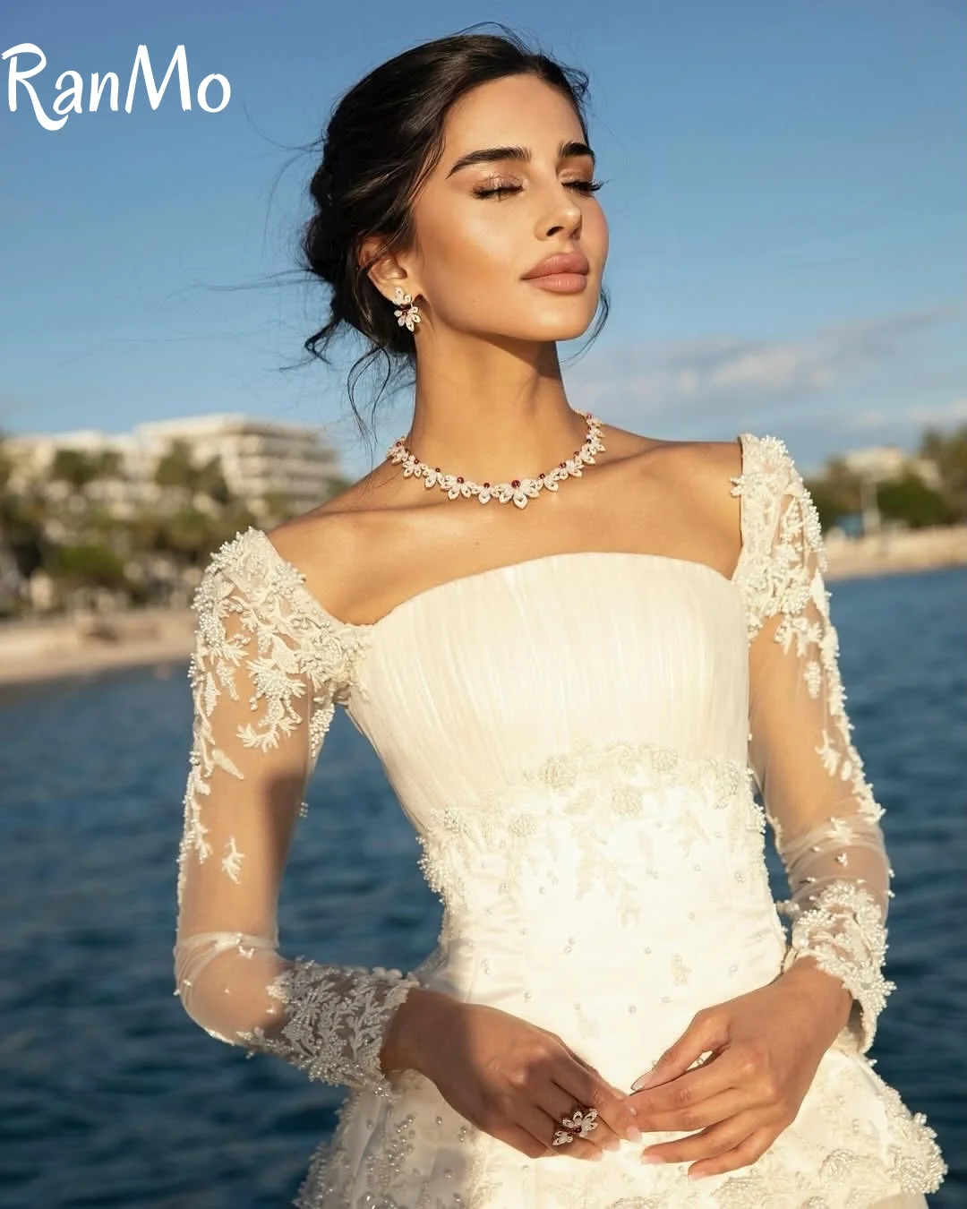 Ranmo 2025 فساتين زفاف رائعة بأكمام كاملة للنساء على شكل حرف a زي العرائس دانتيل لؤلؤ طول الأرض مخصصة فيستدوس دي نوفيا