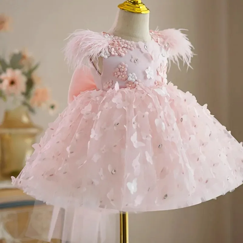 ลูกไม้สีชมพูดอกไม้สาวชุดสําหรับงานแต่งงานยาวผีเสื้อ Appliques Feather Princess First Communion วันเกิดชุดที่กําหนดเอง