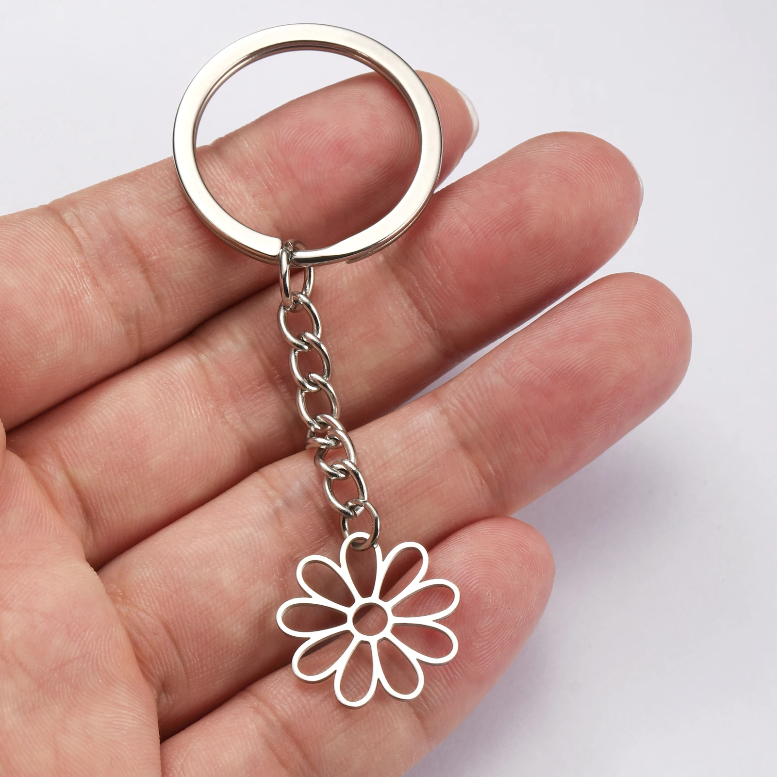 Kkjoy Fashion Stainless Steel Hollow Solid Nine petal Flower Pendant Keychain For Women Couple Birthday Jewelry Gift For Girl