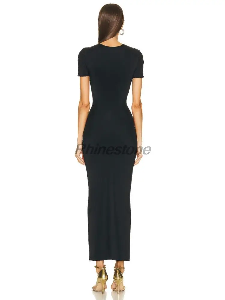 Robe de soirée sexy avec anneau en métal creux, bandage de hanche enveloppé noir, robe de soirée chaude à la mode