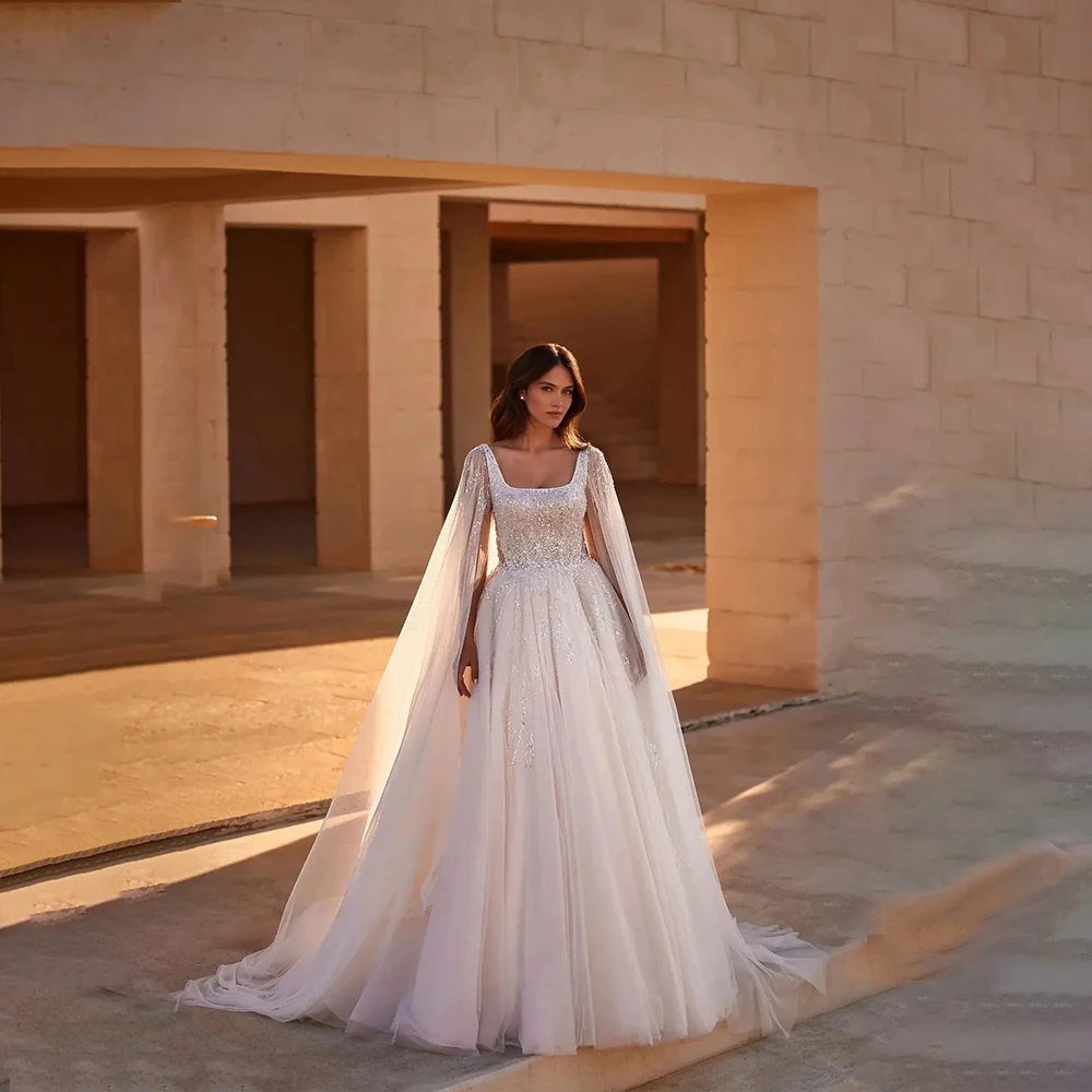

Luxury Wedding Dresses Square Collar Long Floating Sleeveless Bride Dress with Beading Sequined Tulle Bridal Gown Customized