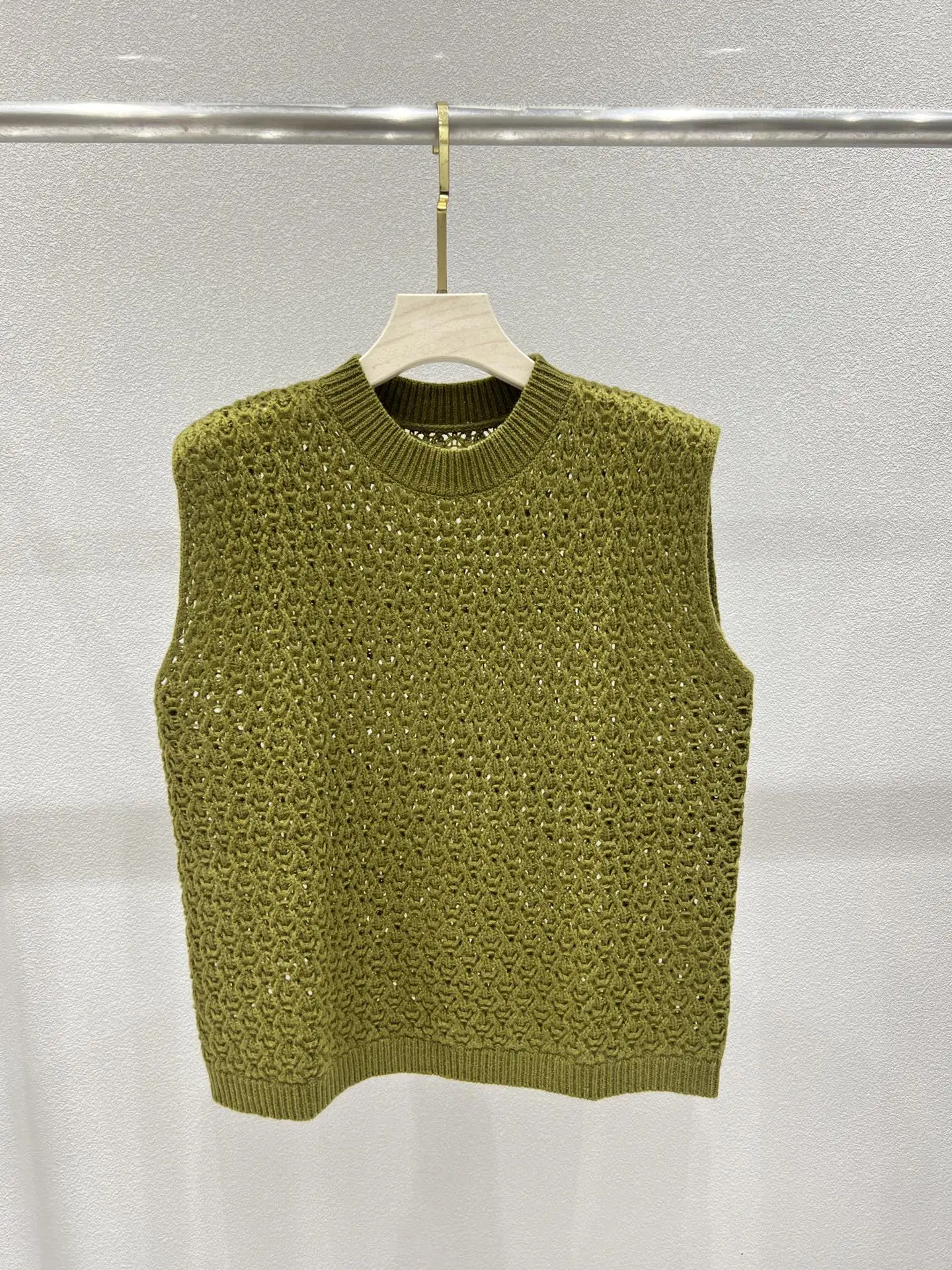 

2025 Early Autumn New Fashion Solid Color Round Neck Hollow Micro-Transparent Knitted Sleeveless Vest Women