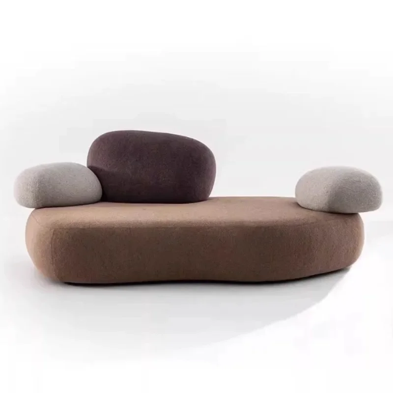 Cremefarbenes Windmodul mit gebogenem Erbsenstein, Sofa