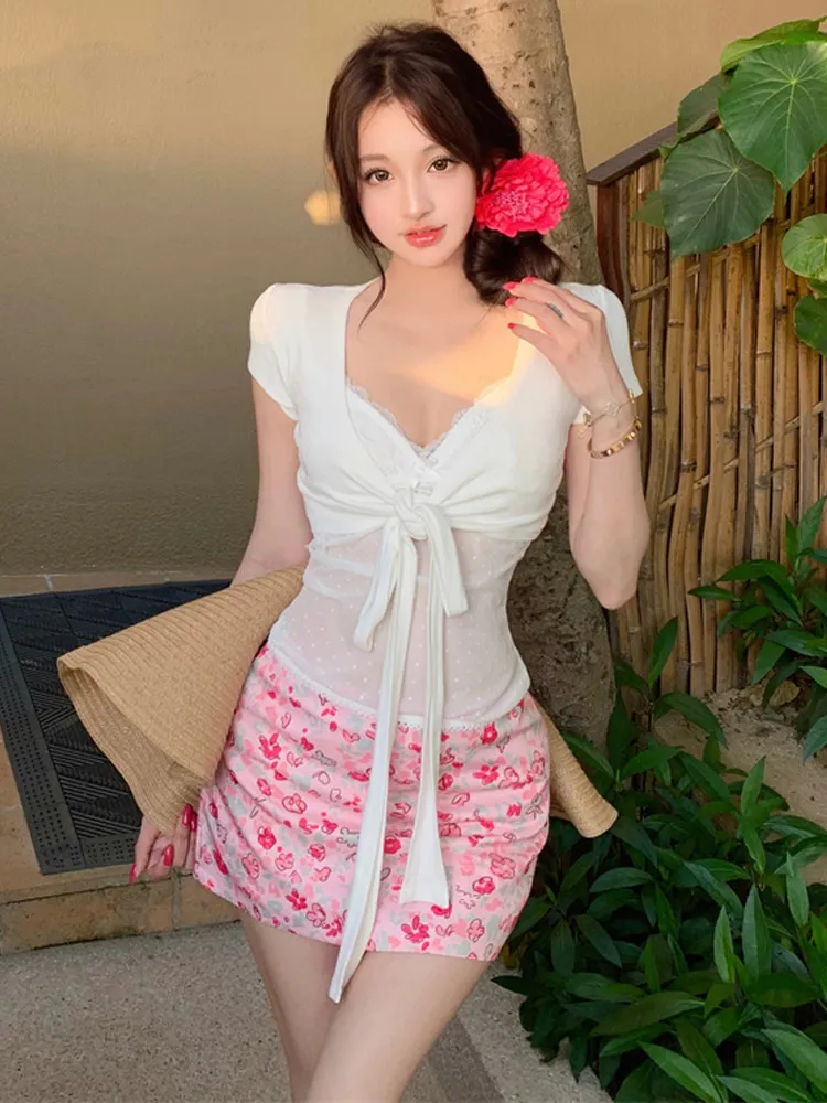 

Sweet and low cut sexy V-neck suspender+lace up sunscreen short cardigan+low waist floral slimming skirt three piece set