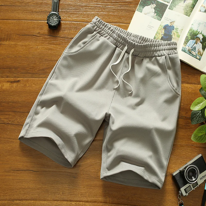 Verão respirável homens malha shorts ginásio musculação casual solto shorts corredores de fitness ao ar livre praia calças curtas moletom L-4XL