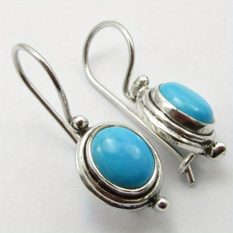 Vintage ovale incrusté Imitation Turquoise femmes boucles d'oreilles ethnique argent métal sculpture à la main motif boucles d'oreilles femme bijoux