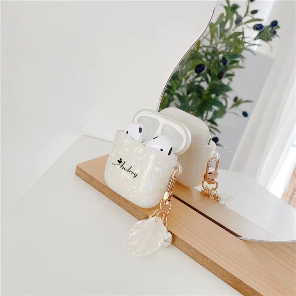 حافظة AirPod مخصصة مع لؤلؤة وقذيفة سحر جمالي اسم شخصي حافظة AirPods لأجهزة AirPods 1 2 Pro 2 غطاء سيليكون فاخر