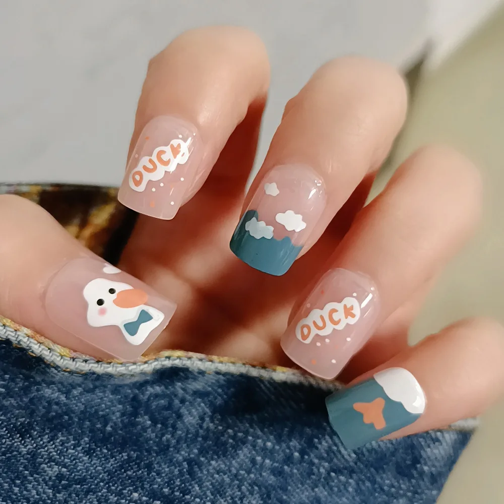 

24pcs Cute Cartoon White Duck Press-On Nails with Cloud, Airplane & Letter Doodles, Sweet Style Short Coffin Shape, Assorted Siz