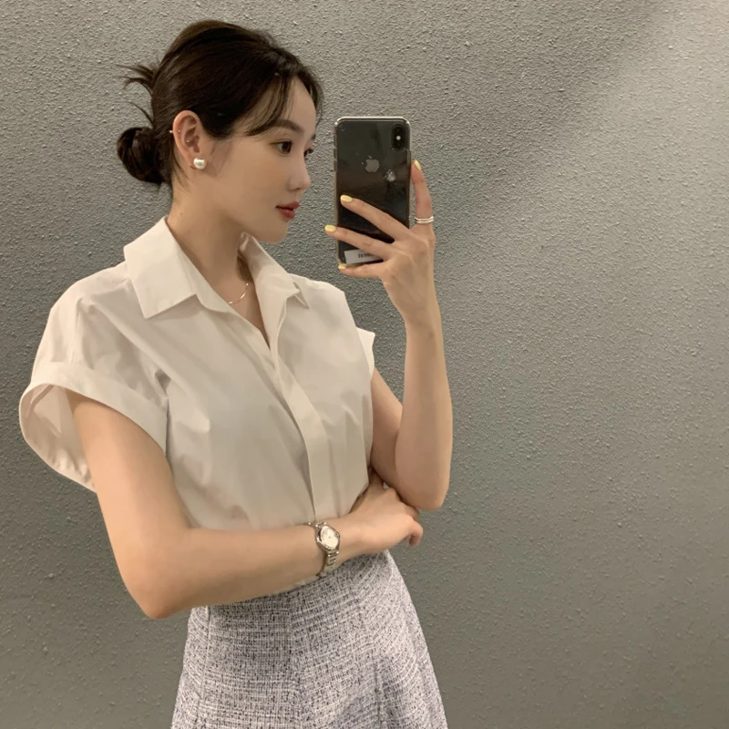 เสื้อเชิ้ตผู้หญิงฤดูร้อน 2023 สไตล์เกาหลี สีขาวลำลอง ผ้าผสม สีพื้น ติดกระดุม ทรงหลวม