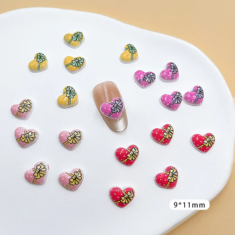 100 unids/pack 9 × 11mm caja de regalo de corazón dijes de resina para uñas-arte de uñas con lazo 3D, bonita decoración de uñas a presión para manicura romántica DIY