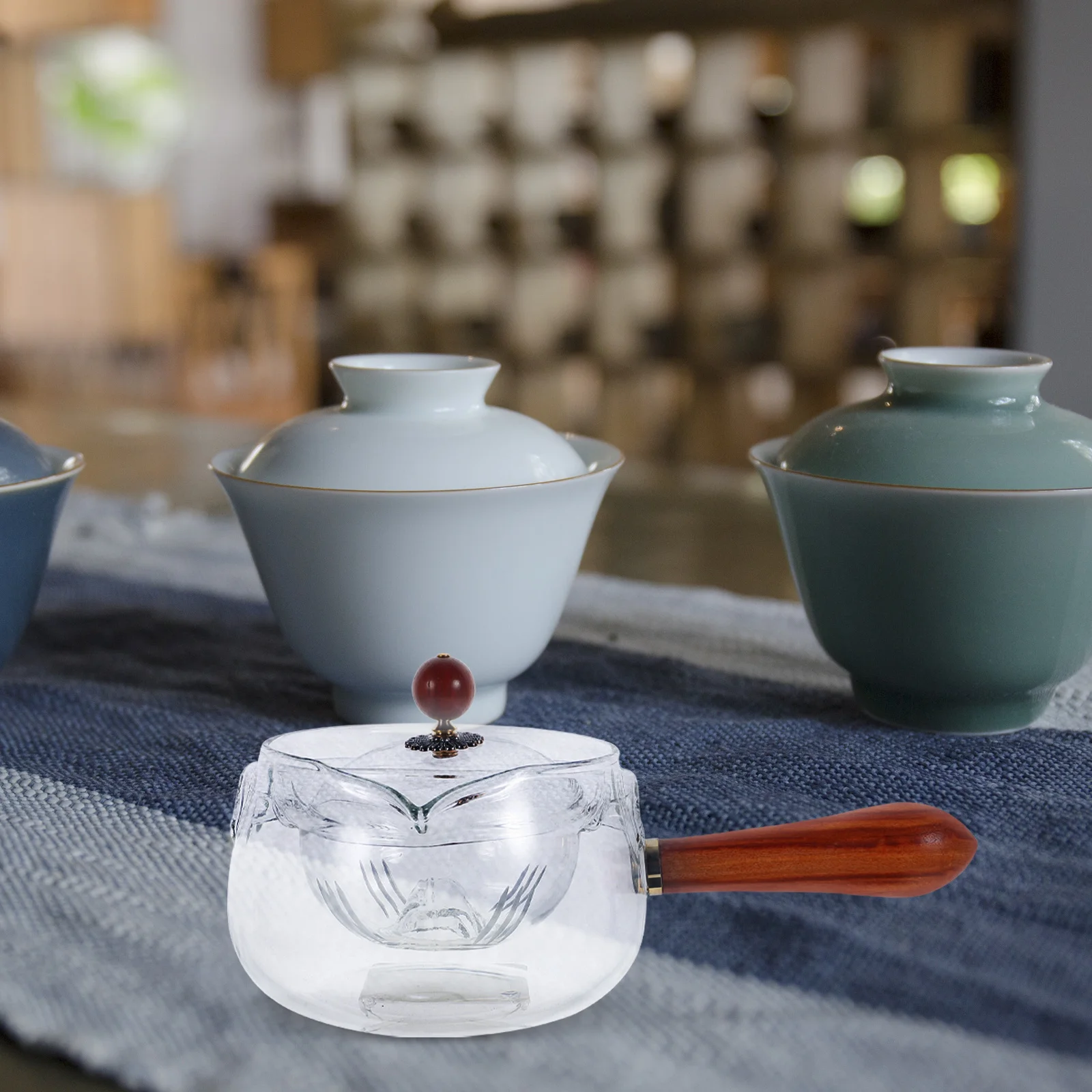 

360 Degree Rotating Teapot Made of Borosilicate Glass Compact Portable Side Handle Design for Home Chinese Tea Brewing Tool