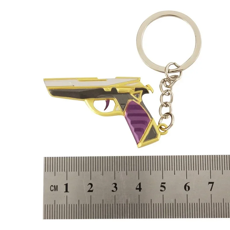 Mini llavero modelo de juguete de pistola púrpura y dorada de 5cm para colección, una mini pistola de juguete muy buena con llavero, accesorios Airsoft