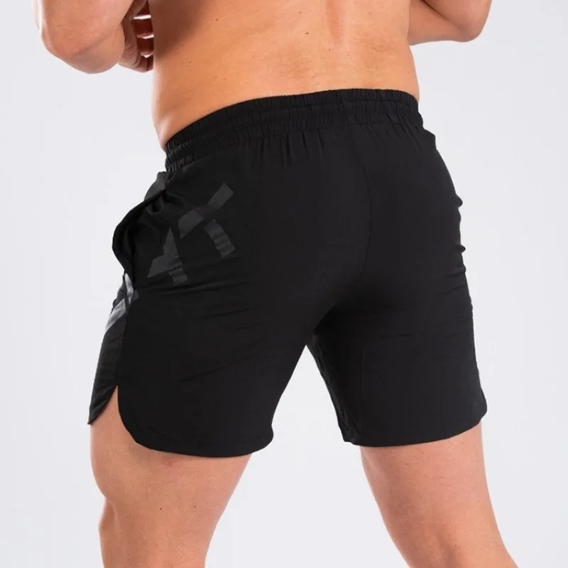 Pantalones cortos informales ajustados para gimnasio y Fitness de verano para hombre, pantalones cortos deportivos musculares de secado rápido para baloncesto, pantalones de chándal para correr en la playa