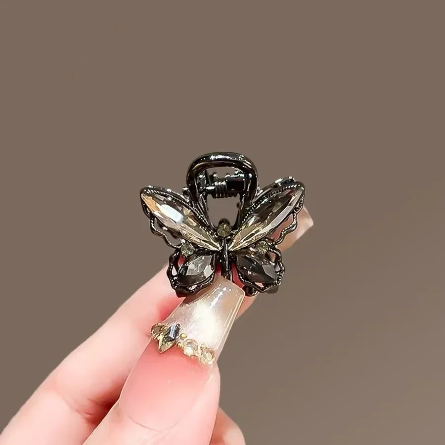 Exquisite schwarze Farbe Kristall Strass Schmetterling Haarklammer Damen süße kleine Haarspange Mode koreanischen Stil Haarschmuck
