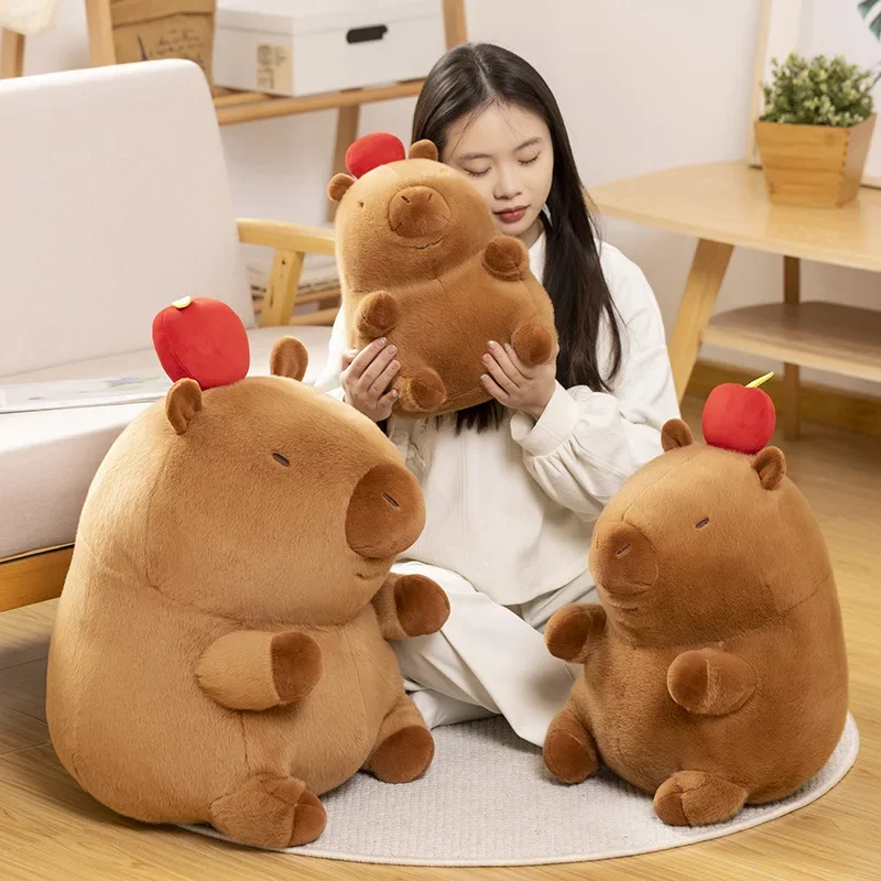 Brown Sitting Capybara Stuffed Aquatic Animal with Red Apple on The Head Fatty Plush Toy Kids Present