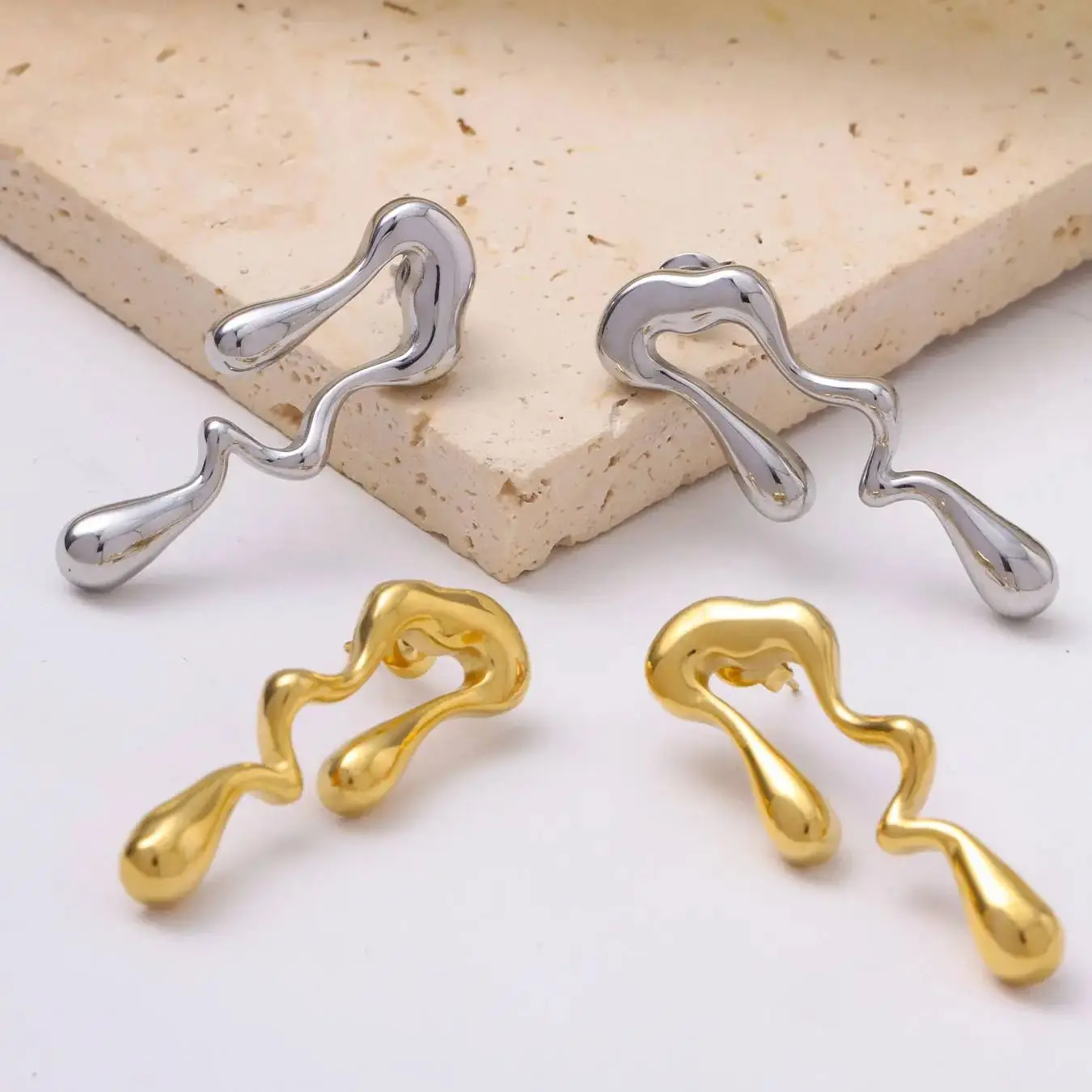 CARLIDANA Unique Female Statement Stainless Steel Earrings Luxury Irregular Teardrop Asymmetric Melting Ice Design Stud Earrings