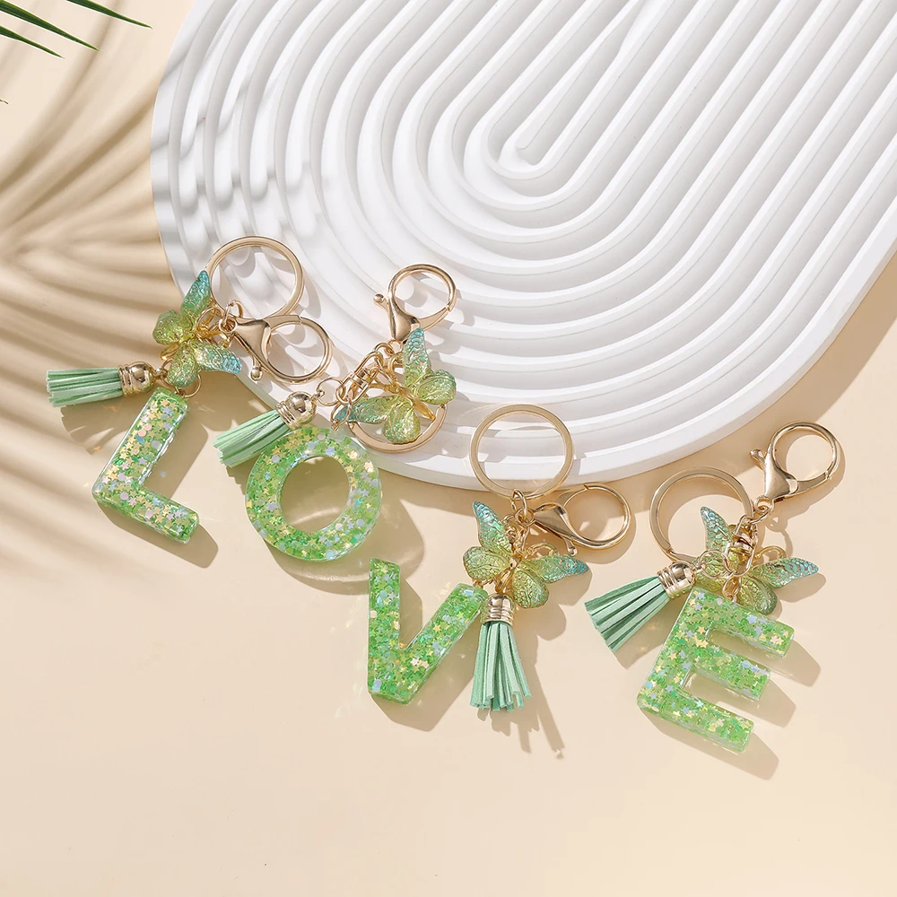 Porte-clés en alliage avec 26 lettres A-Z, 1 pièce, compte-gouttes papillon vert, pendentif en résine pour sac à dos, breloque, cadeaux, artisanat, résultats de porte-clés