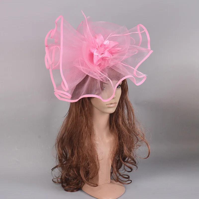 Exaggerated wedding pink mesh hair accessories horse racing-themed headpieces vintage feather and flower head ornaments runway