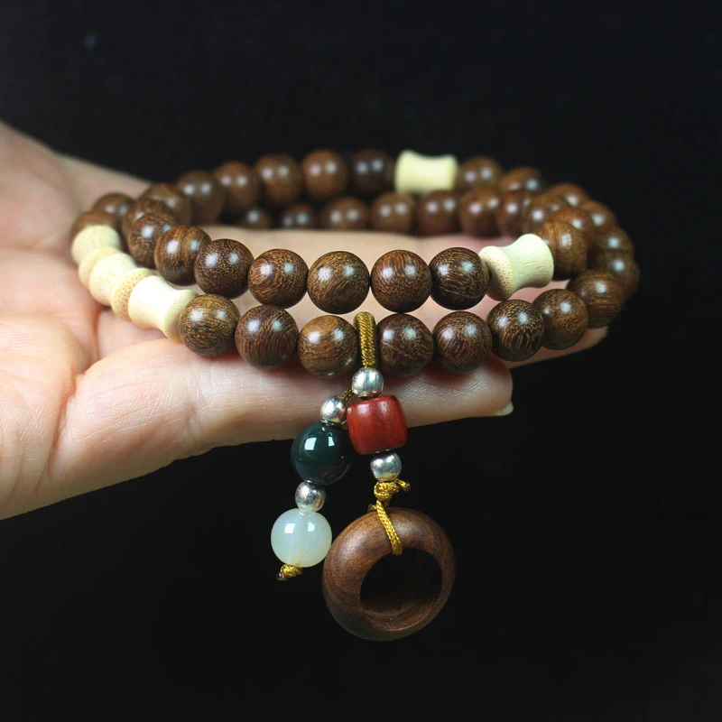 

8mm double-loop gold sandalwood bracelet with bamboo knot design, unisex forest-style jewelry, Buddhist prayer beads