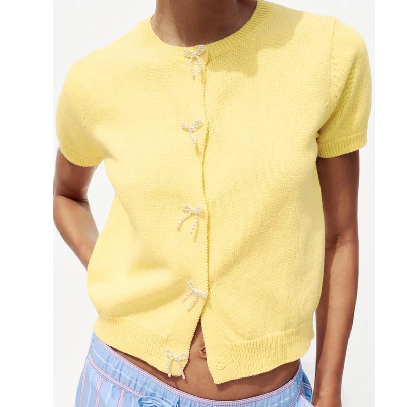 YENKYE 2025 Women Faux Pearl Bow Knit Cardigan Short Sleeve Round Neck Elegant Casual Yellow Top