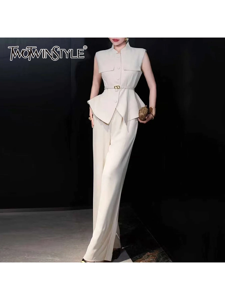 

TWOTWINSTYLE Solid Spliced Belt Two Piece Sets for Women Stand Neck Sleeveless Patchwork Button Top High Waist Pant Set Female