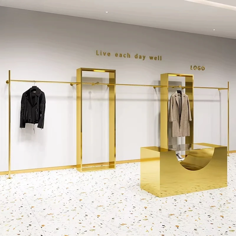 

Clothing store display rack Wall-mounted floor-to-ceiling stainless steel titanium gold hanging clothes rack Women's clothing st