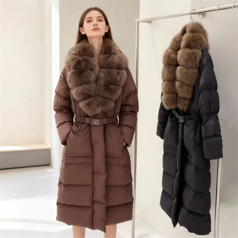 2025 Inverno delle nuove donne grande collo di pelliccia di volpe addensato caldo al ginocchio piumino d'oca moda di alta qualità piumino di media lunghezza