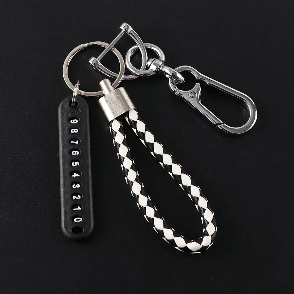 

Автомобильные аксессуары: кожаный плетеный брелок-подвеска для автомобиля с номерной табличкой для телефона, предотвращающей потерю, и кольцом для ключей