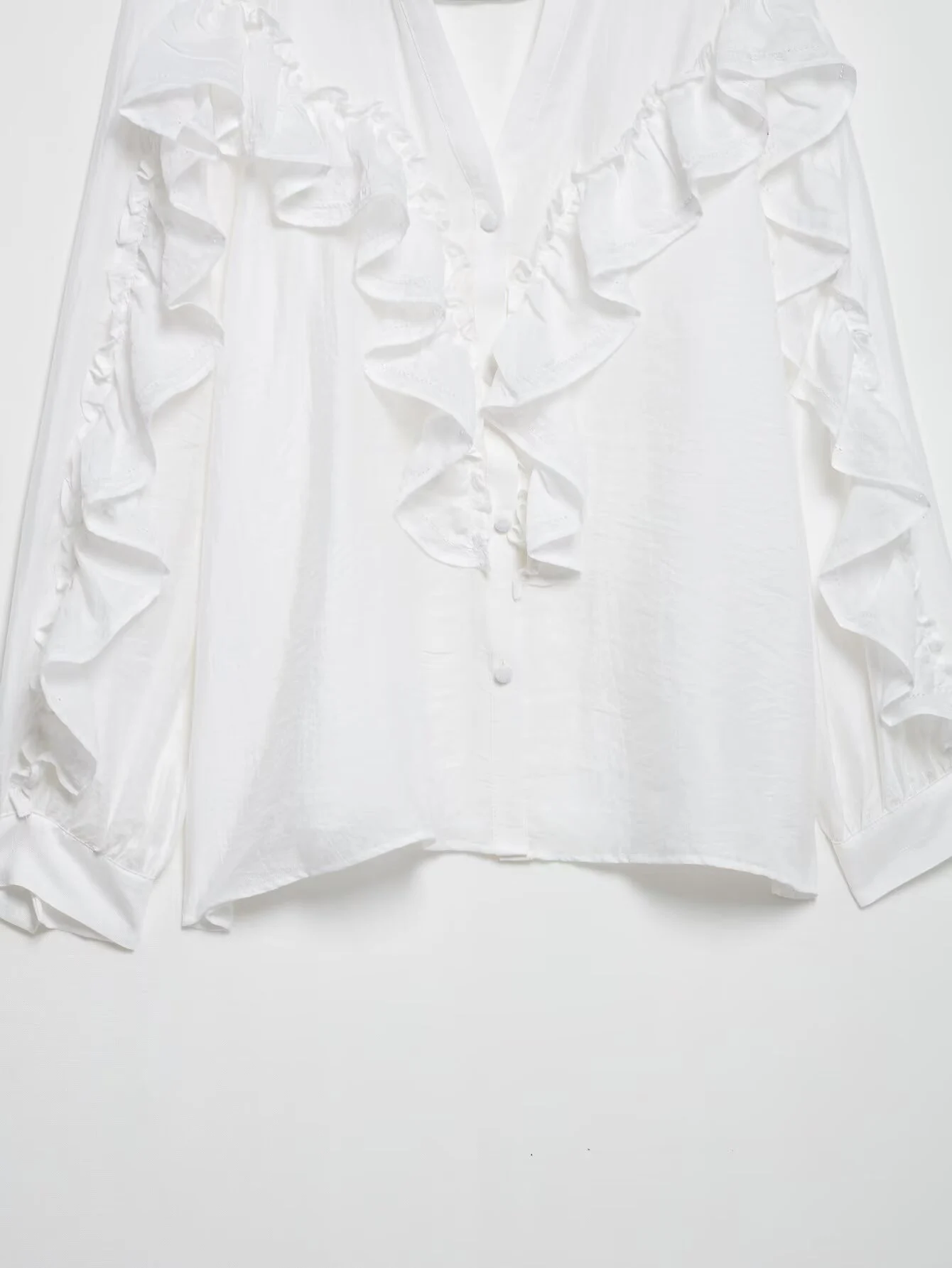 2025 Primavera ed estate nuove donne abbigliamento camicia a maniche lunghe moda decorativa impilata in pizzo verticale