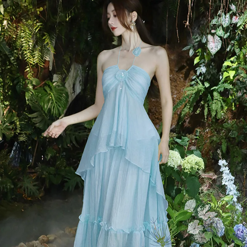 

New Fashionable French Niche Design Sense of Luxury Gentle Breeze Beach Vacation Yellow Hanging Neck Dress for Women 2026 Summer