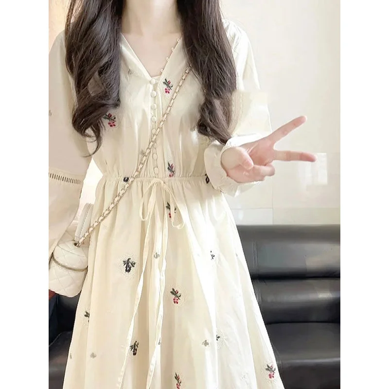 French Design Sense Niche High-end Simple Long Sleeved Floral Dress Women Autumn New V-neck Print Button Bow Drawstring Dresses