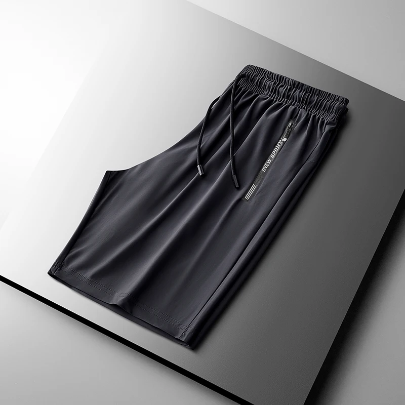 Pantaloncini grandi leggeri da uomo estivi nuovi pantaloni ad asciugatura rapida in seta di ghiaccio Jogger Gym Sweatwear pantaloni sportivi