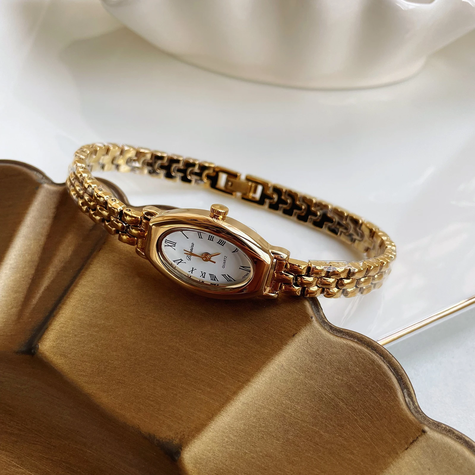 Elegant women's wristwatch, classic style, small gold watch, slender oval shape, vintage quartz women's watch, birthday gift.