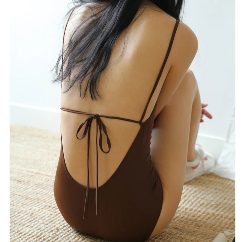 Minsu estilo de celebridad de Internet Sexy negro Retro Tie-up espalda descubierta que cubre el vientre adelgazante triángulo de una pieza traje de baño de primavera caliente