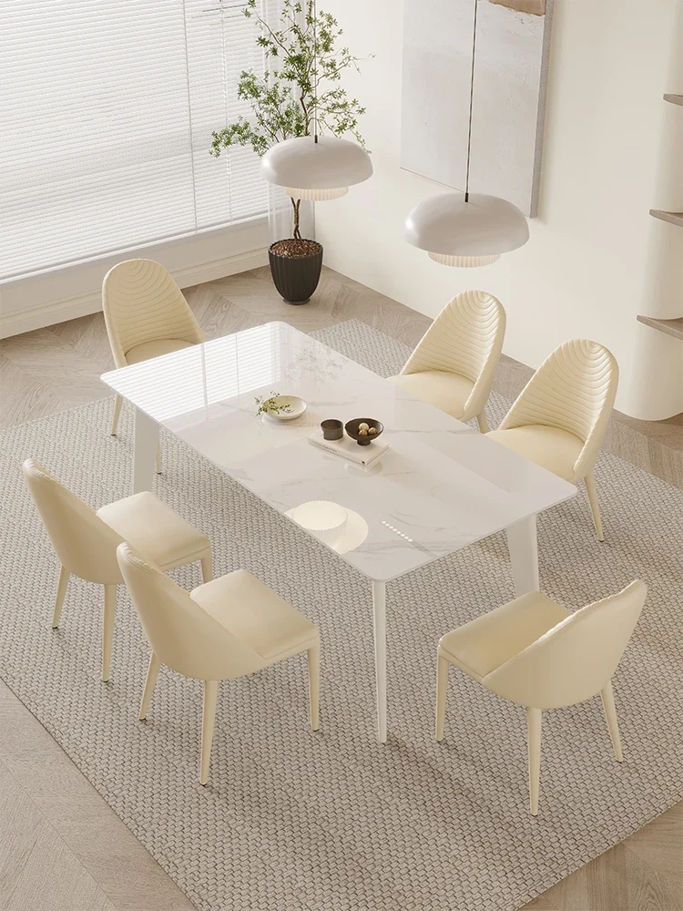 Modern simple pure white dining table and chair combination household small apartment new cream wind to eat.