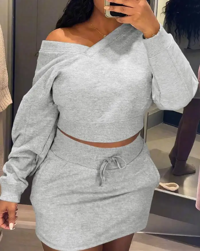 

2025 autumn/winter 2-piece set of V-neck off shoulder and navel top and drawstring elastic waist asymmetric hem skirt set