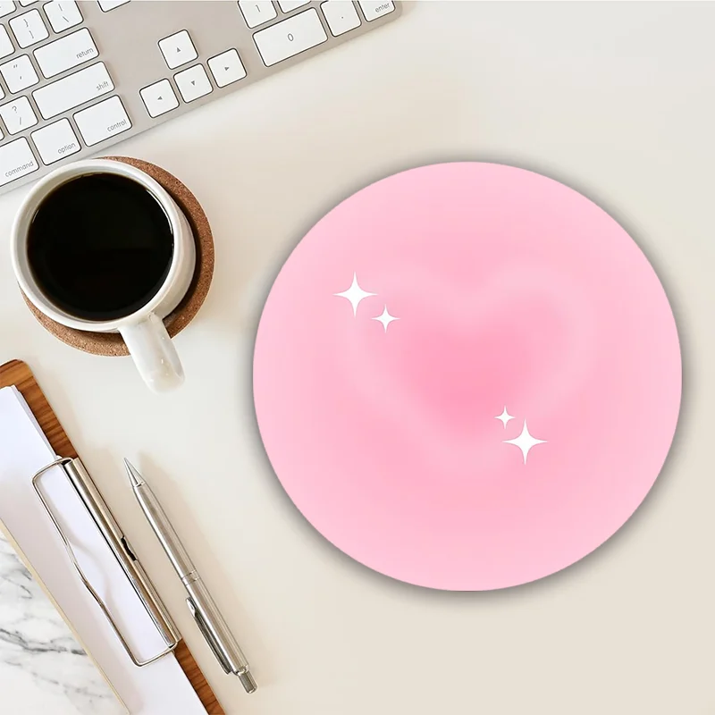 

The cute pink star-shaped round mouse pad with anti-slip rubber base is suitable for both home and office use High quality