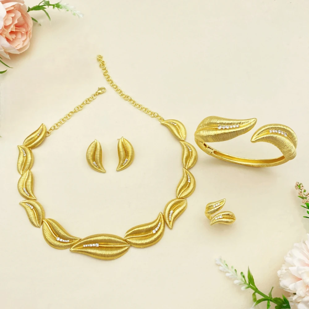 

Falair Gold Plated Copper Women's Jewelry Set with Leaf Shaped Zircon Design Includes Bracelet Ring Necklace Earrings