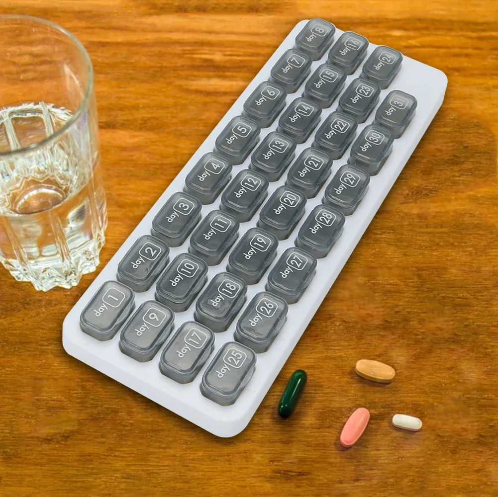 Dispenser di pillole mensile da 31 giorni Scatola portapillole portatile Custodia per medicinali a forma di tastiera per pillole di olio di fegato di merluzzo e vitamine