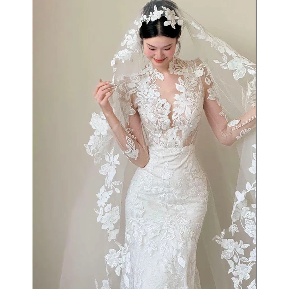 High Neck Mermaid Wedding Dress with 3D Floral Lace & Sheer Long Sleeves, Elegant Train Bridal Gown with Matching Flower Veil