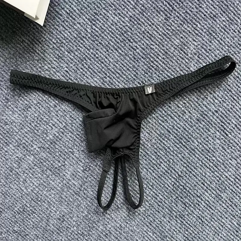Men\'s Sexy Low Waisted Thong With Short Elephant Trunk Ice Silk Thin Cut Hollowed OutThin Straps Solid Color Underware