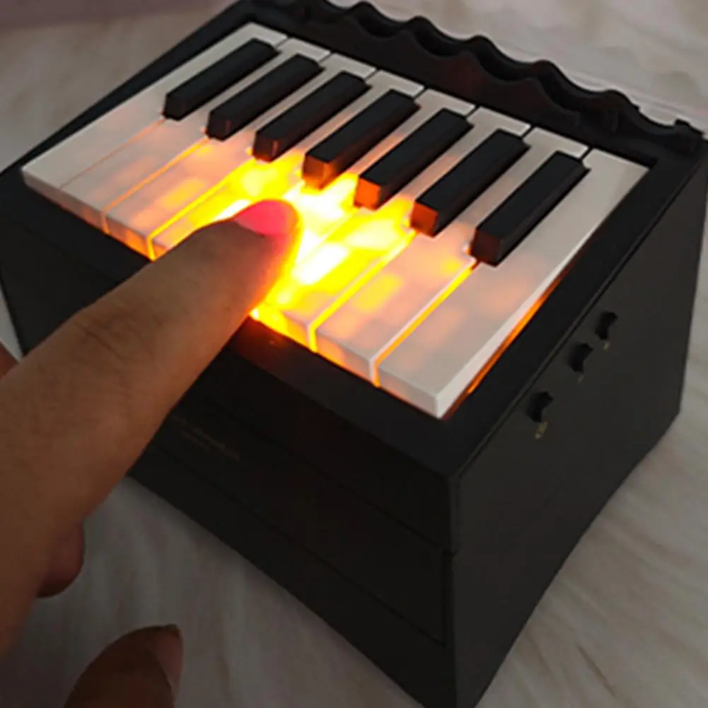Mini pianoforte calendario giocattolo altoparlante Bluetooth con display retroilluminato modalità di riproduzione interattive pacchetto regalo funzione di insegnamento casuale